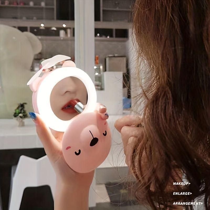 Piggy Glow β 3-in-1 Pocket Fan, LED Mirror & Light